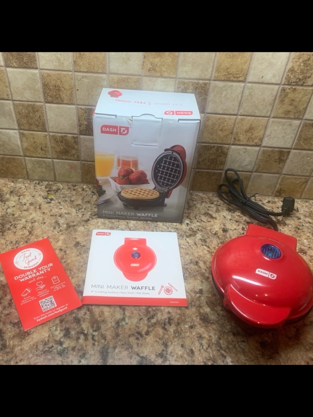 “Dash” Mini Waffle Maker. Color: Red.